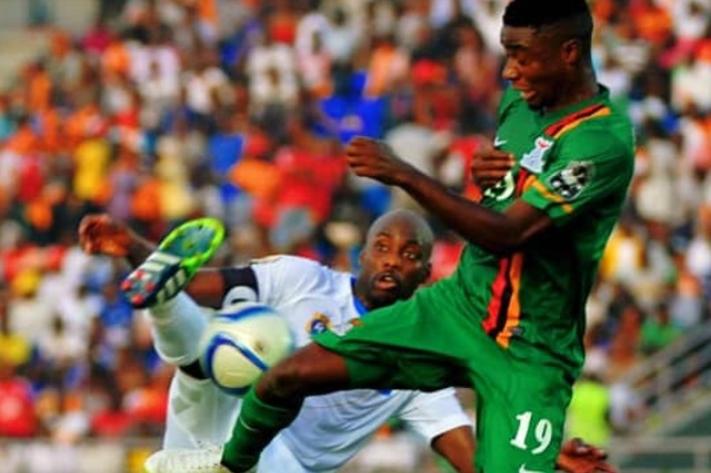 can youssouf_mulumbu_en_duel_avec_le_zambien_nathan_sinkala_jpg_711_473_1