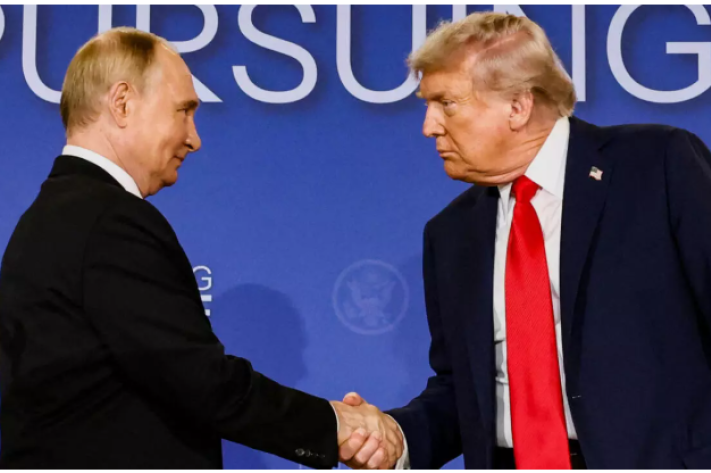 vladimir_poutine_et_donald_trump_aux_usa_25_png_711_473_1